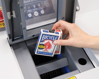 Dedicated shredding chamber shreds full decks of cards, sleeves of dice and stacks of chips