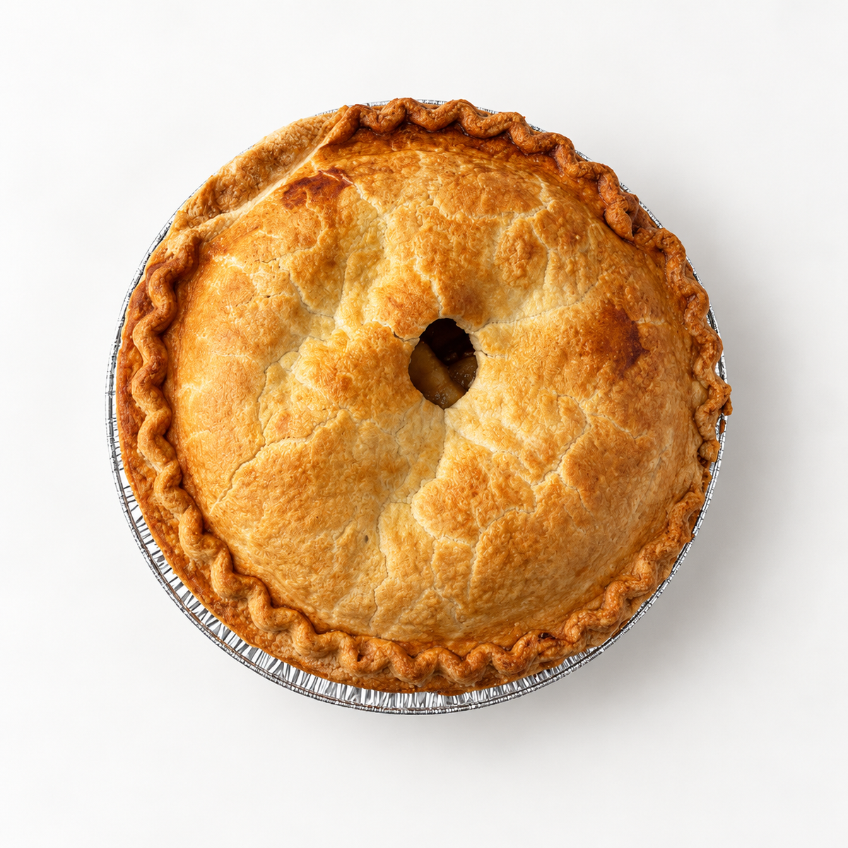 Brown’s Market Crispy Apple Pie with a golden covered crust and crimped edge in a foil pan