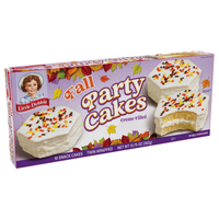 Right-angle view of a Little Debbie Fall Party Cakes box showing creme-filled vanilla snack cakes