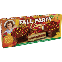 Right-angle view of Little Debbie Chocolate Fall Party Cakes showing yellow cake and chocolate creme filling