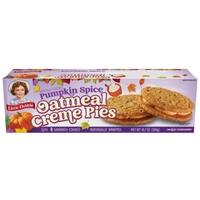 Front view of Little Debbie Pumpkin Spice Oatmeal Creme Pies featuring soft oatmeal sandwich cookies with seasonal creme filling.