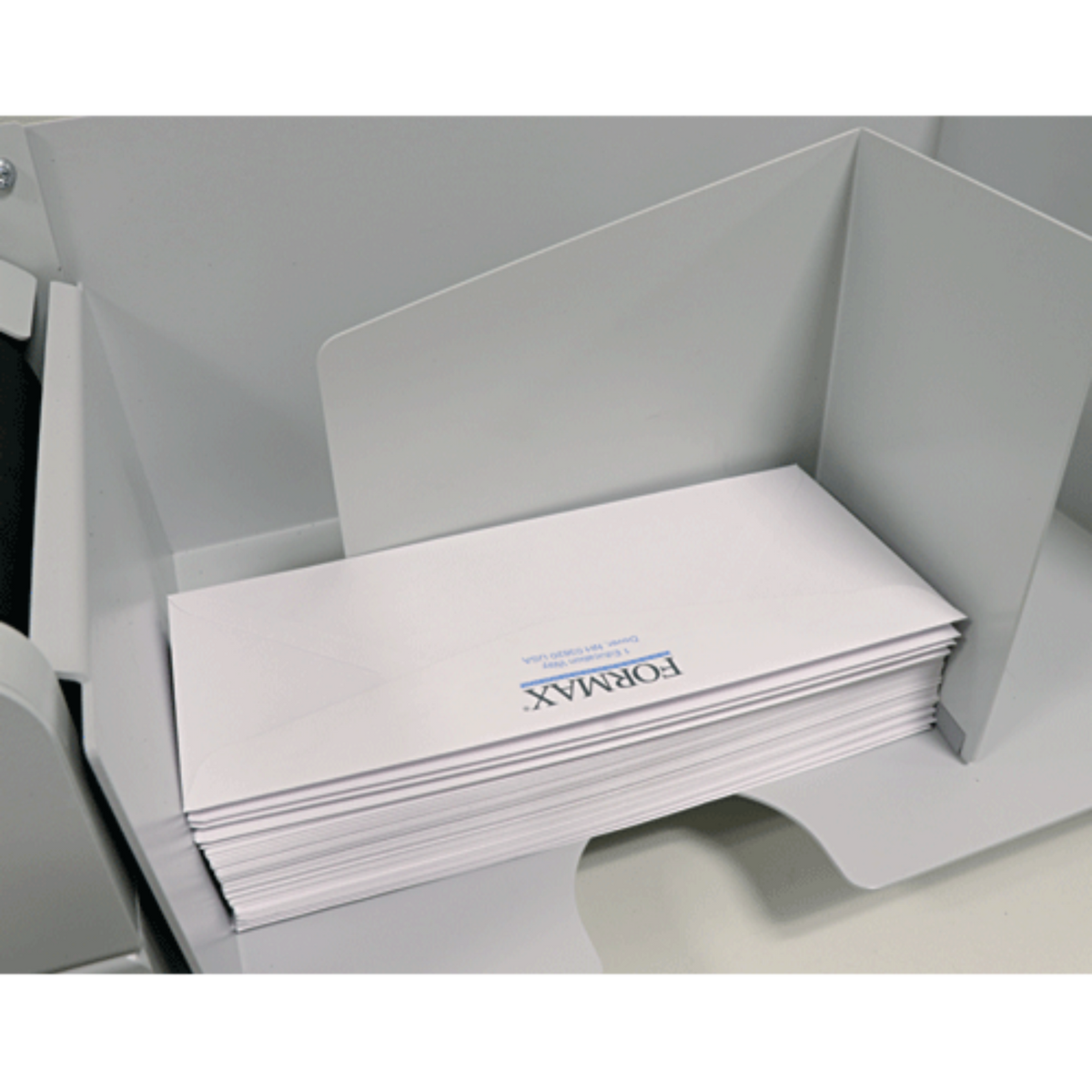 Large outfeed tray handles envelopes up to 9.75″ W x 15″ L