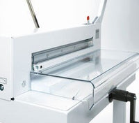 The transparent safety guard makes it so that a cut can only be executed if the hinged safety guard is in the closed position and the blade safety catch is released.