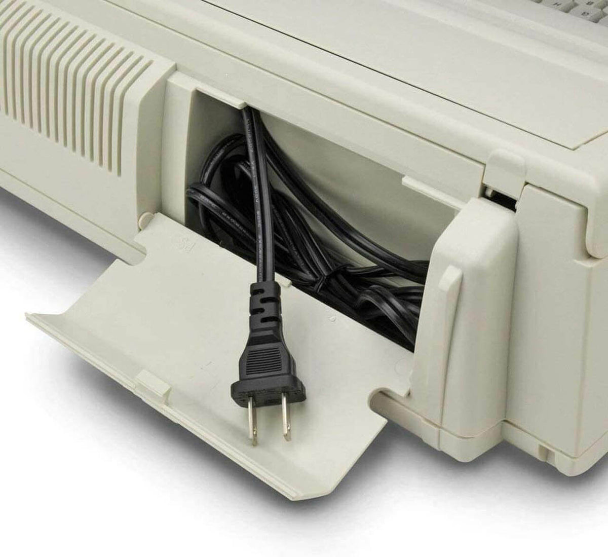 Plug with compartment for the Royal Scriptor II Personal Portable Electronic Typewriter