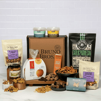 Di Bruno Bros. Binge Watch Gift Box displayed with assorted sweet and savory snacks