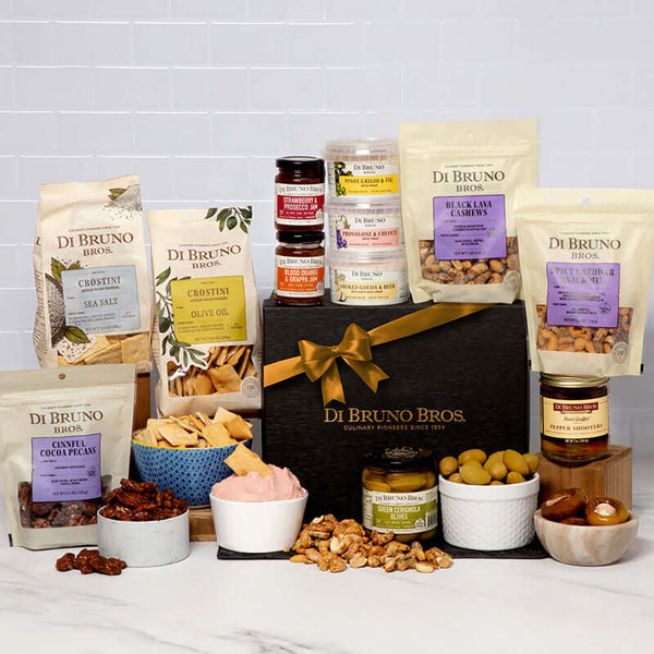 Di Bruno Bros. Happy Hour Kit with gourmet snacks arranged in a black gift box