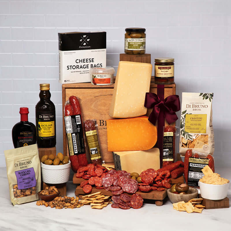 Di Bruno Bros. Fuhgettaboutit gift crate assortment with cheeses, cured meats, antipasti, crostini, and condiments