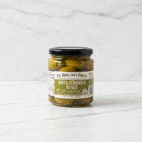 Jar of Di Bruno Bros. green Cerignola olives