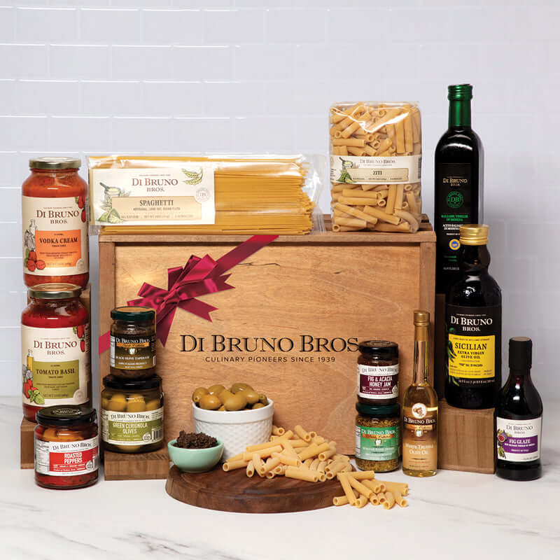 Di Bruno Bros. Italian Kitchen gift crate displayed with pasta, sauces, oils and antipasti