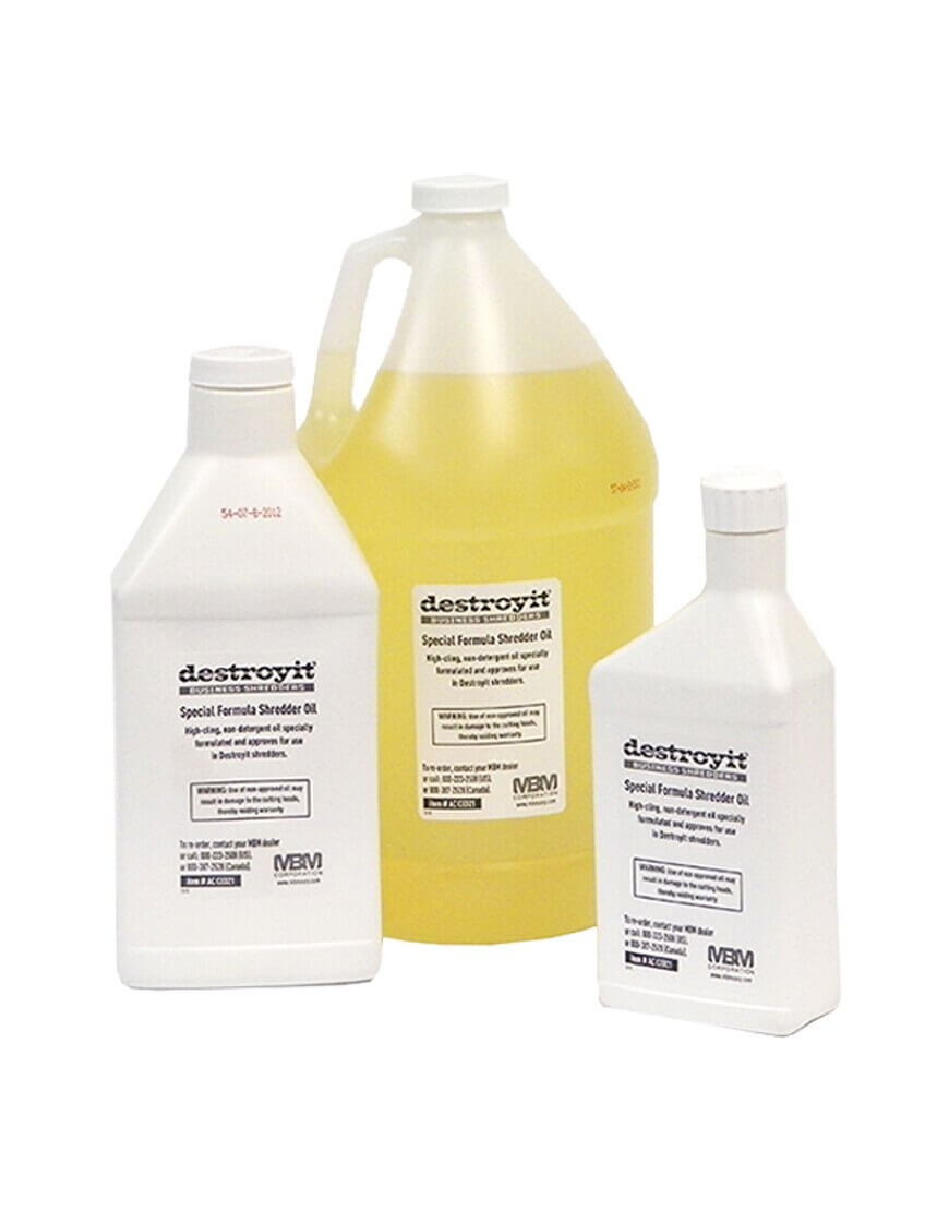 Three different sizes of MBM Destroyit Shredder Oil-- pint, quart and gallon