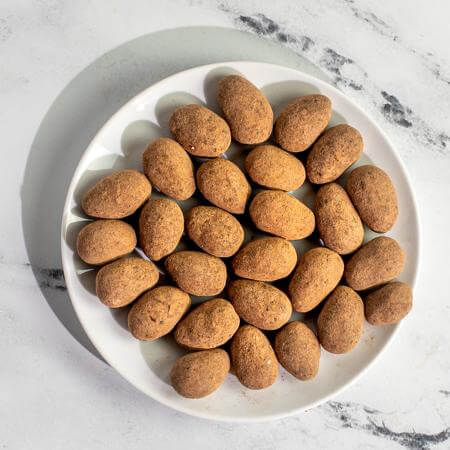 Container of Mitica Piedras de Chocolate, chocolate-covered almonds
