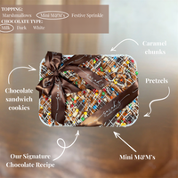 Custom chocolate bark platter with pretzels, caramel, chocolate cookies, candy pieces and decorative drizzle