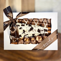 Sarah’s Gourmet Pretzels white eight-piece sampler gift box with display window and brown branded ribbon