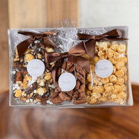 Sarah’s gourmet popcorn, caramel popcorn with nuts and praline pecans in gift-ready packaging