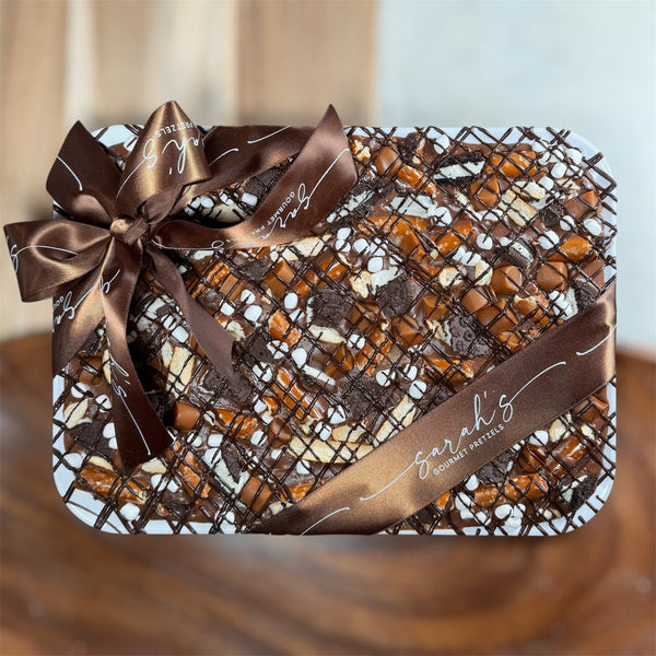 Sarah’s Gourmet gluten-free milk chocolate bark platter with caramel, cookies, pretzels and marshmallows