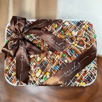 Sarah’s gluten-free chocolate bark platter with caramel, pretzels, chocolate cookies and colorful mini M&M’s