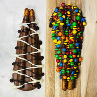 Triple Chocolate and Candy Meltdown gourmet pretzels with chocolate drizzle and colorful candy