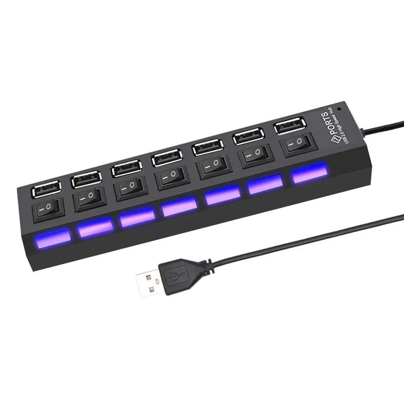 Black seven-port USB-A hub with seven individual switches, indicator lights, and attached USB-A cable